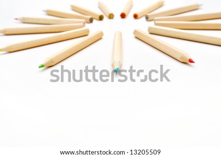 colorful pencils on white background