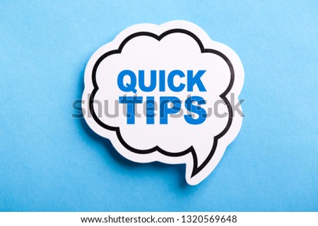 Quick Tips Concept speech bubble isolated on blue background.