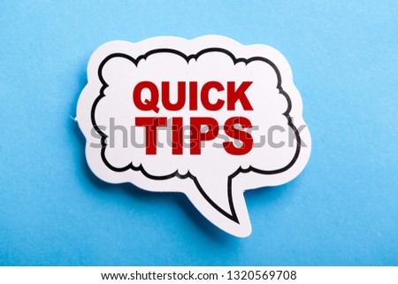 Quick Tips Concept speech bubble isolated on blue background.