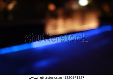 Blue light bokeh effect blurred background.