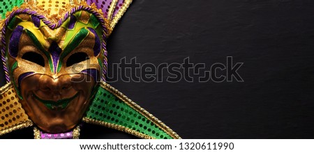 Colorful Mardi Gras mask background