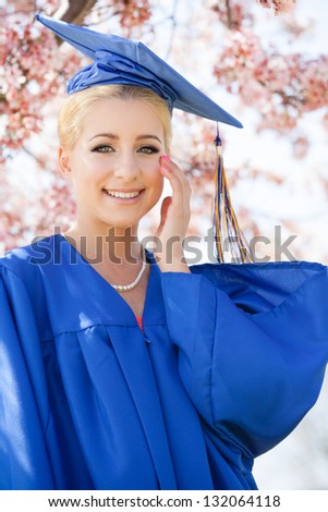 School Graduation Pretty Blonde Latin woman in blue robe