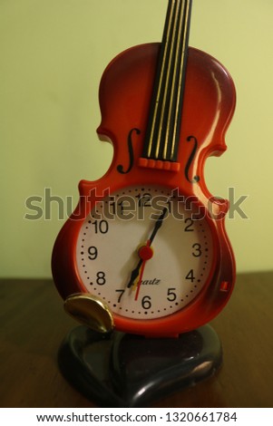 Guitar table watch
