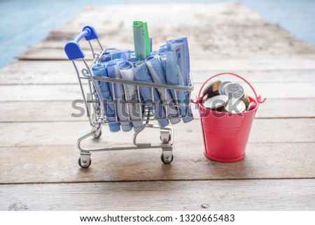 Malaysia money (Ringgit) in trolley. Conceptual image for business, marketing, saving, investment and debt.