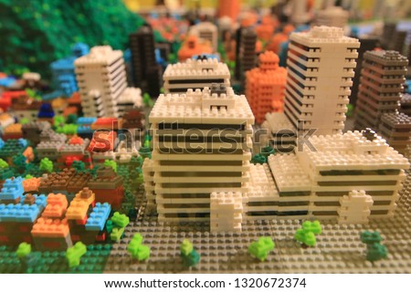 the colorful city building by toys of blocks