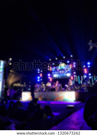 Blurred defocused image from lighting at the night time of​ outdoor​ concert​.Bokeh from the light for abstract background.