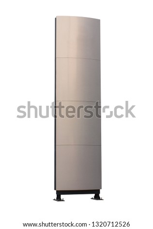 Blank isolated of metallic aluminum grey vertical tall signage announcement standing near the entrance or exit pathway in the evening sunlight, for mockup advertising or branding logo. 