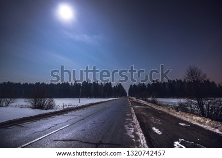 Night landscape of winter road.