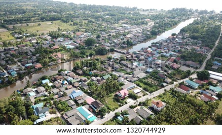 Aerial photo of Ban Lampam canal community in Phatthalung province, Thailand. 