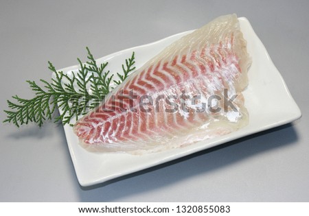 Pagrus major, the red seabream is a fish species in the Sparidae family. In Japan, Pagrus major is known as madai and is prized both for its flavor and for its traditional use as an auspicious food. Royalty-Free Stock Photo #1320855083