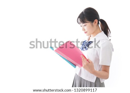 Student in uniform with file