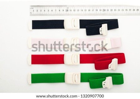 Flexible bandage and laboratory equipment isolated on a white background. Professional clinic instruments. Medical, surgery, ambulance and veterinarian concept. Closeup with soft selective focus