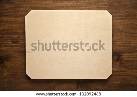 Signboard on wooden background