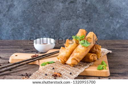 deep fried spring rolls, Por Pieer Tod or Fried spring rolls (Thai Spring Roll) Snacks and snacks that are popular with Thai and Chinese people. Royalty-Free Stock Photo #1320955700
