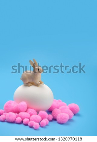Easter toy Bunny and egg on background. Easter holiday, festive spring season. creative minimal decor. Close up, copy space