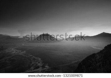 Breathtaking view of volcano at Bromo. Consisting of Active Bromo,  mount Batok,  and Mount Semeru. Beautiful landscape landmark and  popular destinations in indonesia. Black and White photography. 