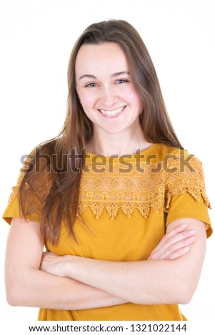 young beautiful smiling portrait woman with arms crossed in white background