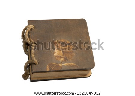 Old retro dirty paper notebook isolated above white background. Copy space on the old paper notebook above white background