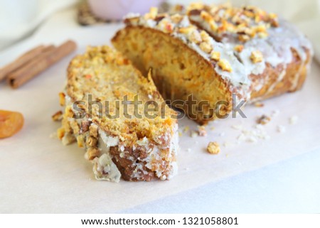 Cinnamon-apricot vegan cake with a cup of black tea Royalty-Free Stock Photo #1321058801