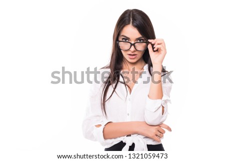 No way. Really. Shocked attractive businesswoman in glasses is holding them with her fingers amazed and with open mouth on pure light grey background