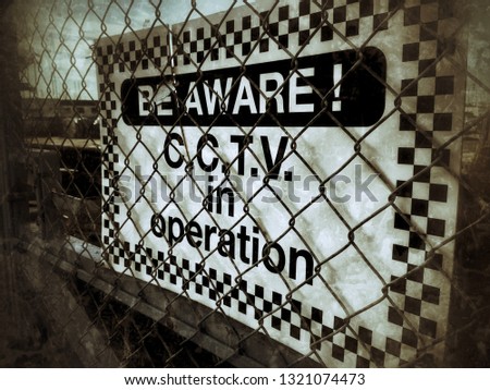 Black and white warning signage