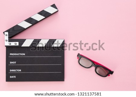 black clapperboard with free space for text isolated on color background