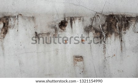 Natural stain on the white wall. Abstract artistic background.