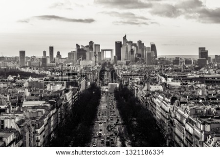 Magnificent look from Arc de Triomphe (Triumphal Arc) towards the La défense before sunset - the parisien trade quarter, in black and white