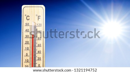Thermometer in summer day shows or indicate high temperature degree with sun in background.
 Royalty-Free Stock Photo #1321194752