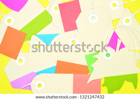 Paper tag on color background, ideal for your shopping projects or business topics.