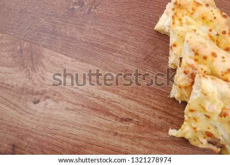 pizza on wooden table