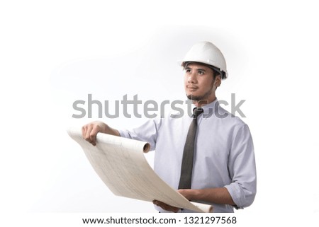 Portrait of asian engineer or architect holding blueprint isolated on white background