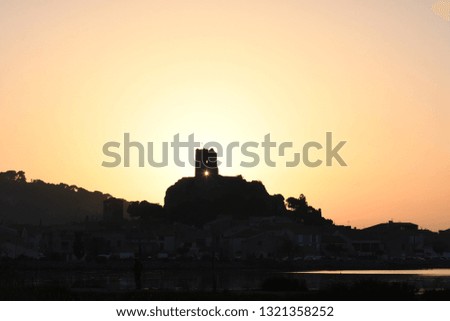 sunset on the medieval castle in mediterranean