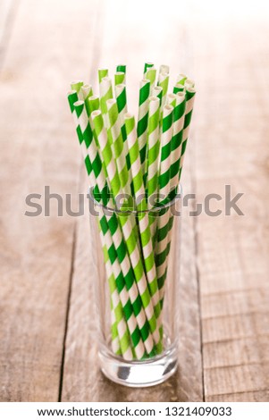 Colorful Straws, green drinking straws in a glass cup