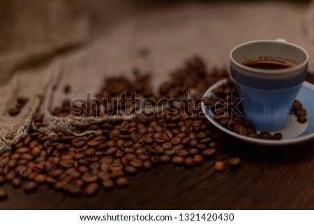 Coffee beans on grey background