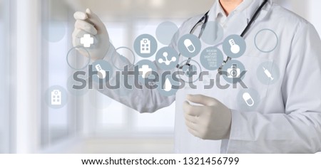 Medical icons and young  doctor with stethoscope