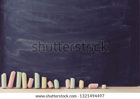 back to school concept background with chalk board