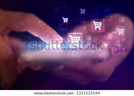 Finger touching phone with online shopping concept and dark background