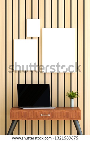 3D Rendering : illustration of mock up laptop pc put on wooden desk. three frame hanging on wall. front view of technology gadget laptop. blank screen for graphic editor. clipping path included.