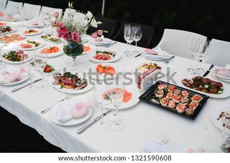 Salty dishes prepared for the event on a white table.