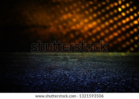 Spotlight over concrete floor. dark black background