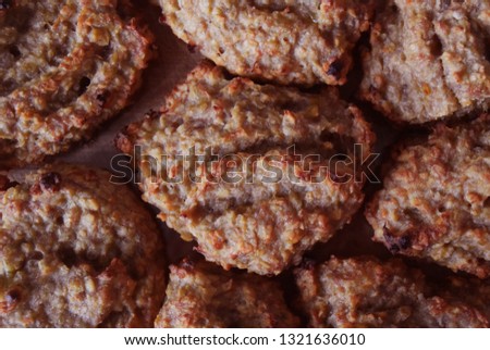 
Background picture with homemade oatmeal cookies on a transparent glass plate. Top View