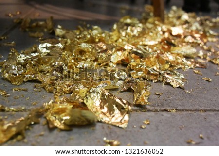 A picture of the background with gold leaf on the tiled floor. Art material - potal