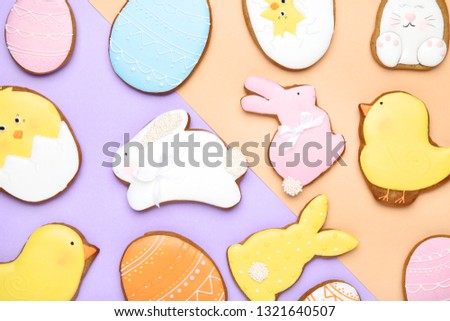 Easter gingerbread cookies on colorful background