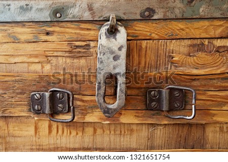 Lock and hinges for closing the old wooden chest in vintage style