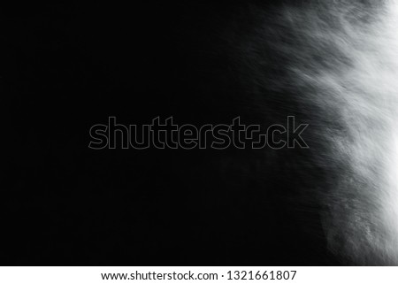  abstract splashes of water on a black background 