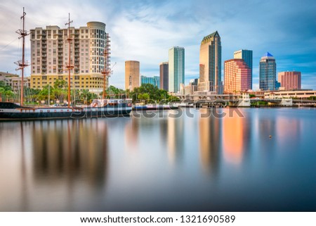Tampa, Florida, USA downtown skyline on the bay at twilight.