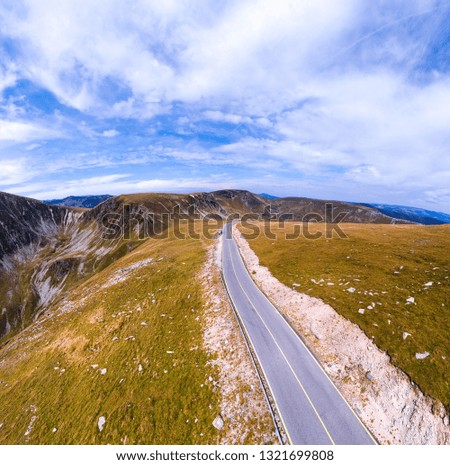 Aerial view on transalpina road on Romania mountain, travel, adventure concept, motorcyclists way, vacation place, mountains top, autumn day, square photo