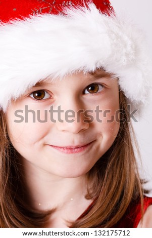 Cute little christmas girl on a white background