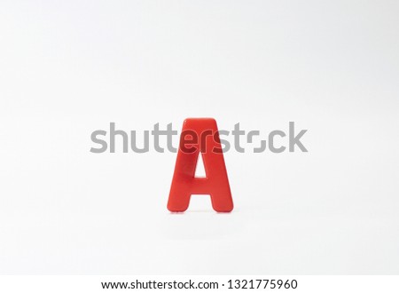 Plastic letter 'A' isolated on white background.